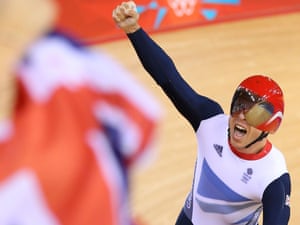 Sir Chris Hoy celebrates after setting a new world record and winning gold in the Men's Team Sprint Track Cycling final at the Velodrome. Hoy now has five gold medals
