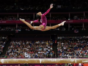 Gabrielle Douglas performs on the balance beam during the artistic gymnastics women's individual all-around competition.