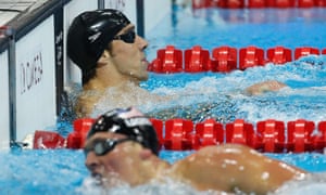 Second placed Ryan Lochte touches the wall