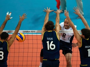 William Priddy of the USA gets a spike past Brazil's wall of defence