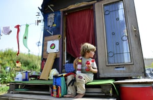 Wagenburg settlement: Nolan, 4, sits in front of his home