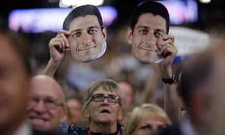A delegate holds up a mask Paul Ryan at the Republican Convention, Tampa