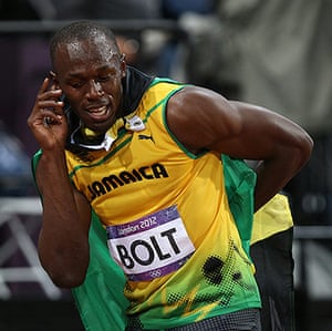 Bolt's Ticks: Usain Bolt celebrates his gold 