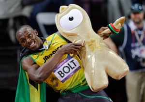Bolt's Ticks: Jamaica's Usain Bolt celebrates winning gold