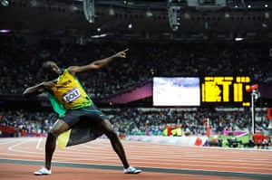 Bolt's Ticks: Usain Bolt wins the men's 100m and celebrates