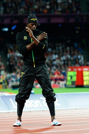 Bolt's Ticks: Jamaica's Usain Bolt dances prior to competing in the men's 100m final