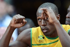 Bolt's Ticks: Jamaica's Usain Bolt gestures prior to the race