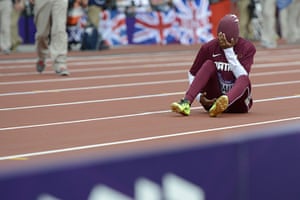 Olympic pain: Qatar's Noor Hussain Al-Malki reacts after sustaining an injury 