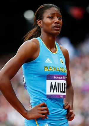 Olympic pain: Shaunae Miller of Bahamas cries after suffering an injury in her 400m heat 