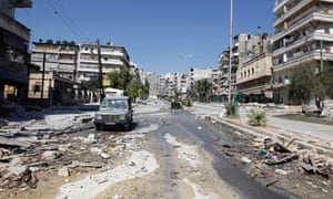 A street in the Salahedin neighborhood after clashes between the Free Syrian Army fighters and Syrian Army soldiers on 8 August. Photograph: Reuters/Goran Tomasevic 