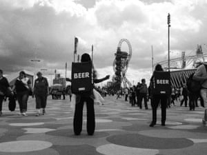 Beer sellers in the Olympic Park looking a bit like astronauts headed back to mission control.
