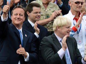 British Prime Minister David Cameron gives a thumbs up next to London mayor Boris Johnson