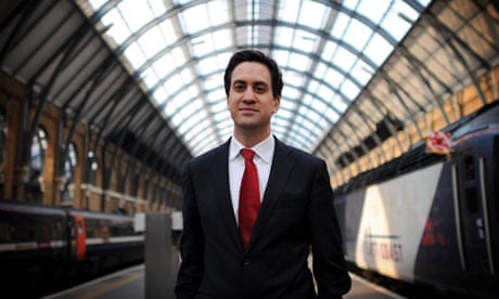 Ed Miliban poses for a photocall in Kings Cross station, London