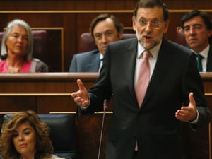 Spanish Prime Minister Mariano Rajoy answers a question during a parliamentary session at the Spanish parliament in Madrid September 12, 2012.