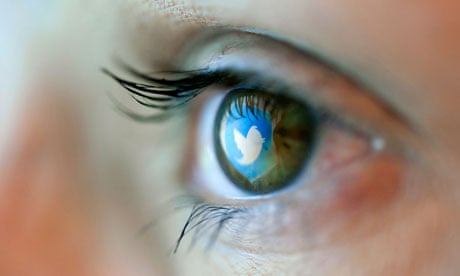 Reflection in an eye of the Twitter logo