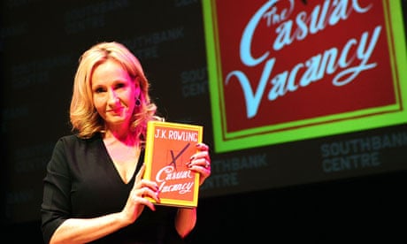 JK Rowling holding a copy of The Casual Vacancy