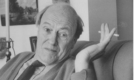 Roald Dahl pictured waving a cigarette in conversation at home