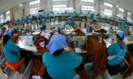 Chinese garment factory workers prepare products for export