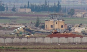 Syrian air force helicopters at the captured base in Taftanaz in the northern province of Idlib. Islamist rebels seized control of the base on Friday after storming the compound with a captured tank earlier this week.