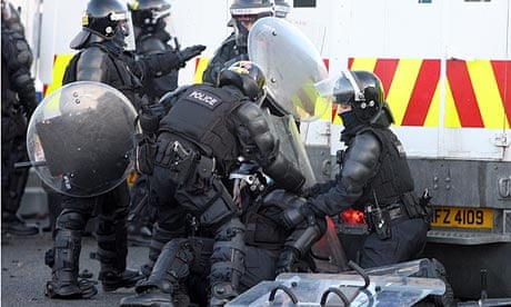 A police officer is injured after loyalists attacked police lines in Belfast on 12 January 2013