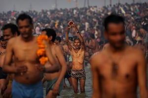 Kumbh Mela: Indian Hindu devotees pray at Sangam