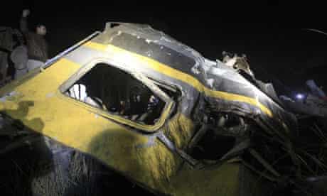 Part of a shattered train carriage after a crash that killed Egyptian army recruits
