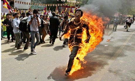 Tibetan man in flames at a protest in New Delhi, India, 2012 