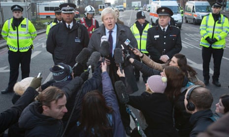 London mayor Boris Johnson speaks to the media after attending the scene of a crashed helicopter in Vauxhall, London January 16, 2013. REUTERS/Neil Hall (BRITAIN - Tags: DISASTER POLITICS) :rel:d:bm:LM1E91G1ACZ01