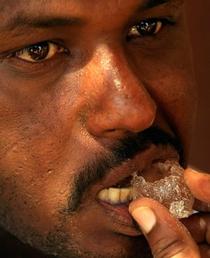 Sudan gum arabic: A man eats a gum arabic in the market in western Sudanese town of El-Nahud