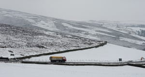 uk weather: Snow covered fields are pictured on the