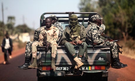 Malian soldiers on their way to Markala, north of Bamako, last week