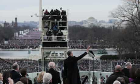 Barack Obama waves to crowds.