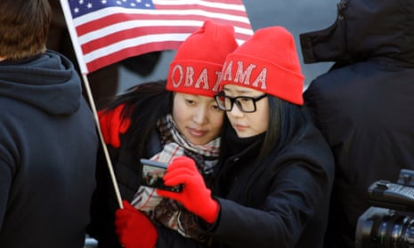 Fans from afar: Khongorzul Battsengel, left, and Ariunbolor Davaatsogt both from Mongolia, take a picture of themselves as they wait for President Barack Obama on Pennsylvania Avenue.