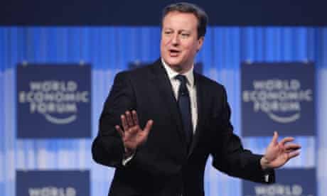 Britain's Prime Minister David Cameron shows his jazz hands during the annual meeting of the World Economic Forum in Davos, Switzerland. Read our report on the day's events.