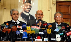 Reform leader Mohamed ElBaradei flanked by former presidential candidates Hamdeen Sabbahy and Amr Moussa at opposition press conference at which they shunned President Mohamed Morsi's offer of talks.  The National Salvation Front called for demonstrations nationwide on 1 February, to achieve the "goals of the revolution".