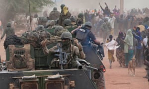 French troops arrive in Timbuktu, Mali, yesterday. Photograph: Reuters