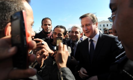 David Cameron takes a walk through Martyrs Square in Tripoli, Libya where he met local market traders and visitors.