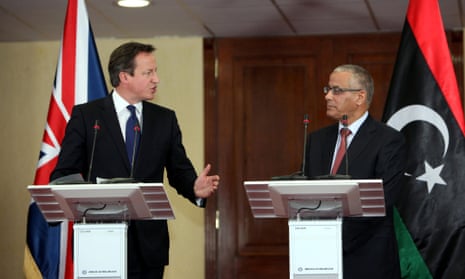 Cameron speaks during a press conference with Libyan Prime Minister Ali Zidan.