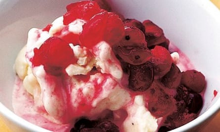 Banana ice cream with warm cranberry sauce