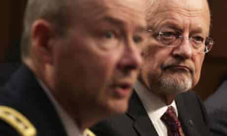 Keith Alexander and James Clapper before a Senate intelligence committee hearing in September.
