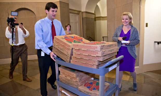 Pizza being taken to John Boehner's office as the House speaker held talks with Republicans after the collapse of a deal to raise the government debt ceiling temporarily.