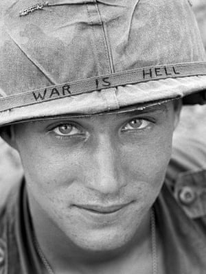AP Vietnam: American soldier wears a hand-lettered slogan on his helmet