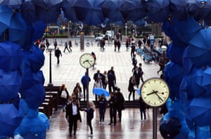 Made up from 500 individual umbrellas, an installation covers Canary Wharf in London.