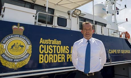 Tony Abbott unveils a vessel to combat immigrants arriving by boat at Larrakeyah Barracks in Darwin