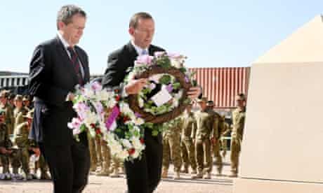 Bill Shorten and Tony Abbott lay wreaths as a mark of respect to the fallen during the recognition ceremony