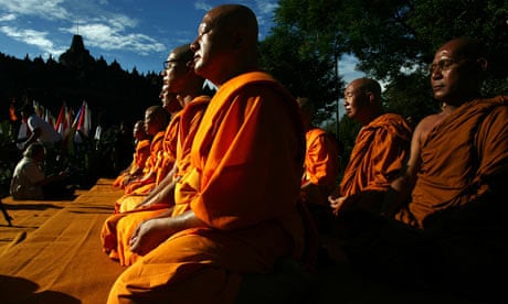 Buddhist monks meditate in Indonesia