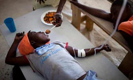 A young Haitian girl suffering from cholera