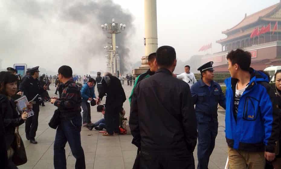 Smoke raises from the scene of the attack in Tiananmen Square.