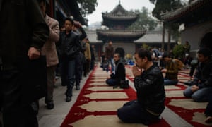 Muslim worshippers attend Friday prayers at a mosque in Beijing.