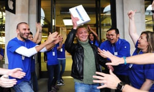 Air launch: Constanstin Zabrodskiy, from Moscow, is congratulated by Apple employees after being the first to buy the iPad Air at the Apple store in Convent Garden, London.